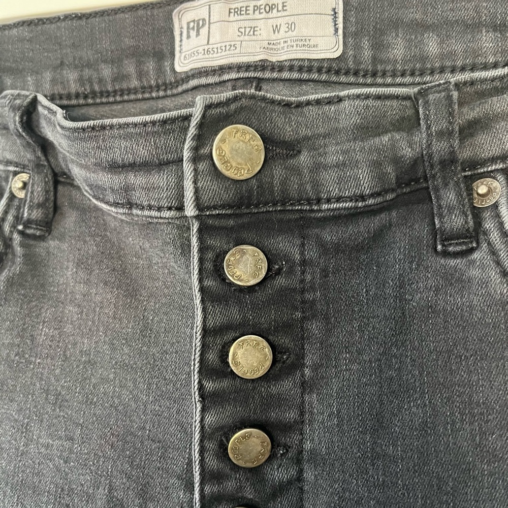 Free People black button fly skinny jeans with raw hem